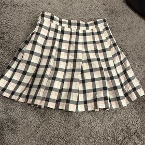 New with tags, size 78 Jessica Simpson skirt, black pink and white side zipper.